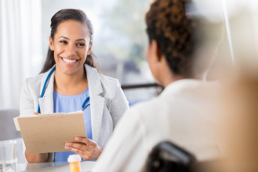 Doctor Talking To Patient Fulton County Hospital